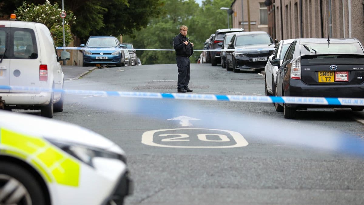 Police cordon off Spotland Road in Rochdale amid reports of serious assault