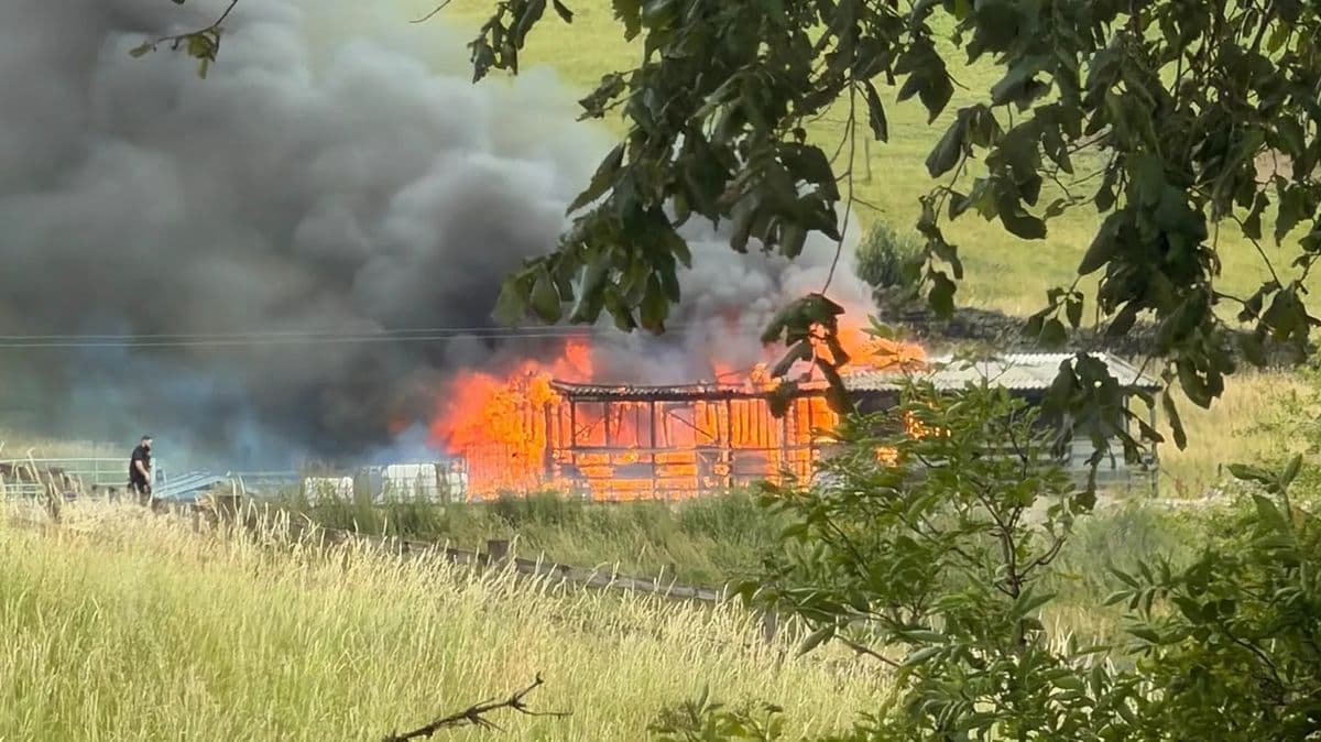Murder investigation launched after woman dies in Rochdale farm fire