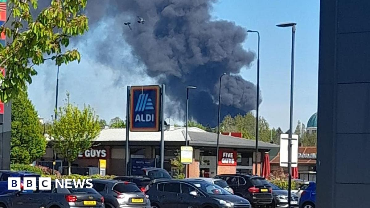 Major fire breaks out at Trafford Park industrial estate with smoke visible across Manchester